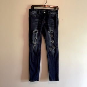 Covergirl distressed skinny jeans